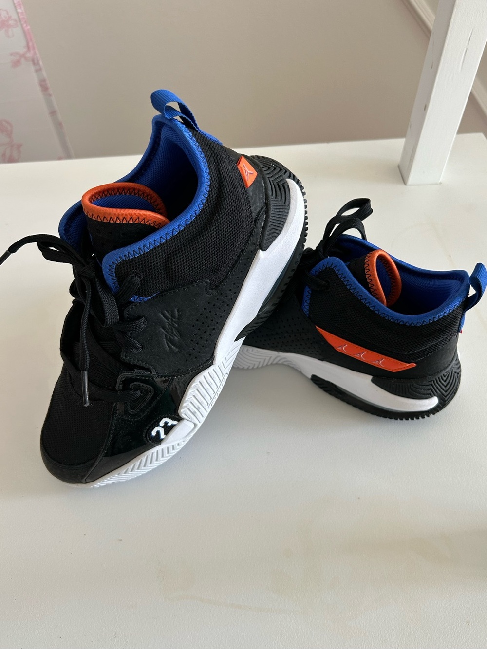 Jordan Kids Black Sneakers with Blue and Orange Trim